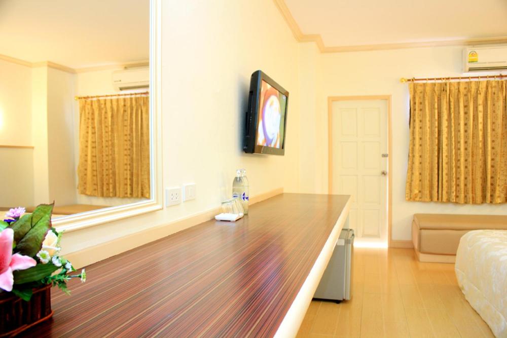 TV a/nebo společenská místnost v ubytování P.A. Ville Hotel