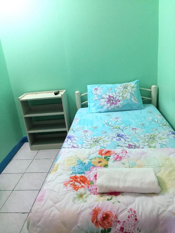 Postel nebo postele na pokoji v ubytování NAT 2 Guest House