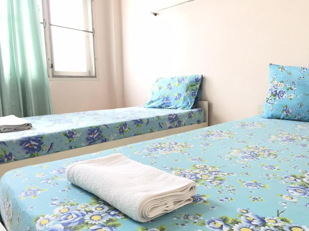 Postel nebo postele na pokoji v ubytování NAT 2 Guest House