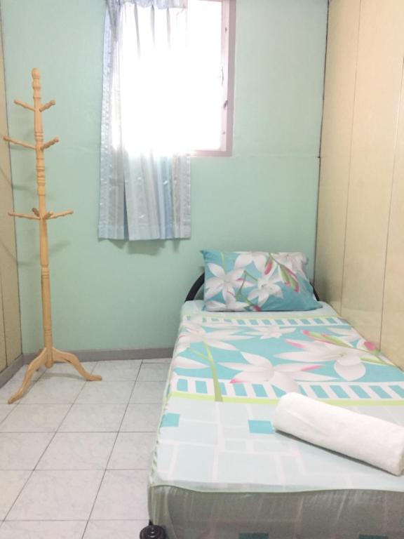 Postel nebo postele na pokoji v ubytování NAT 2 Guest House