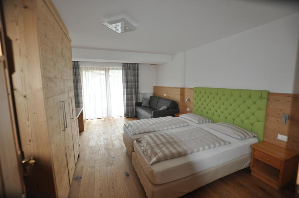 Postel nebo postele na pokoji v ubytování Piccolo Hotel Claudia No Pets