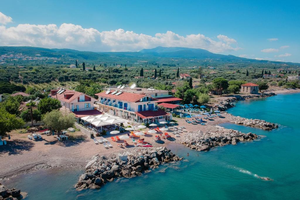 an aerial view of a resort on a beach at Aggelos Hotel in Agios Andreas