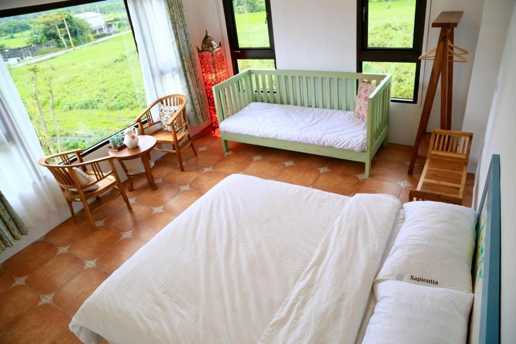 Postel nebo postele na pokoji v ubytování Sapientia
