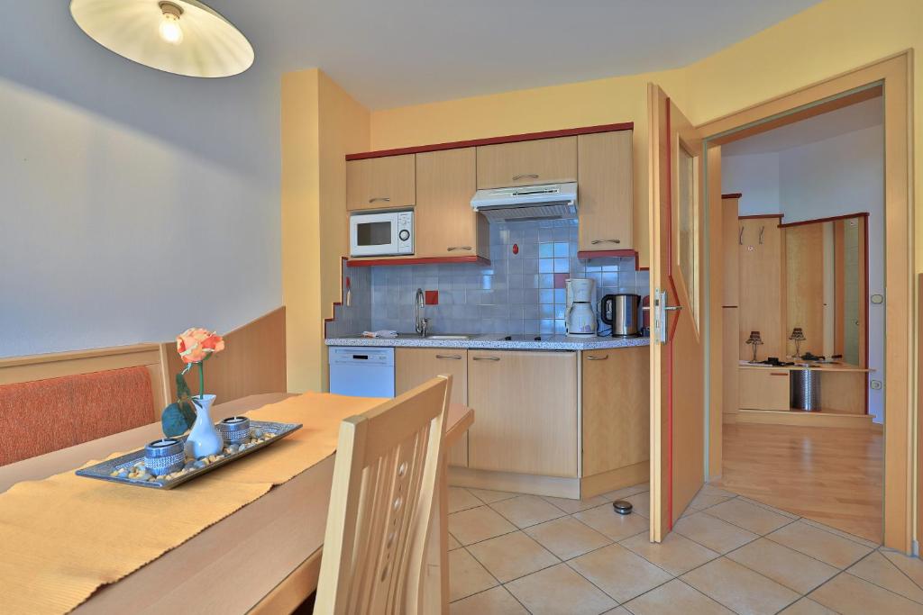 Kuchyň nebo kuchyňský kout v ubytování Hotel Garni Zerza
