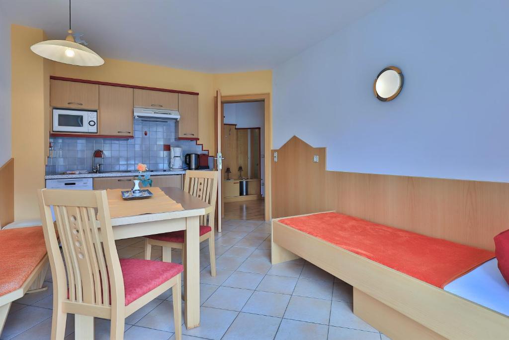 Kuchyň nebo kuchyňský kout v ubytování Hotel Garni Zerza