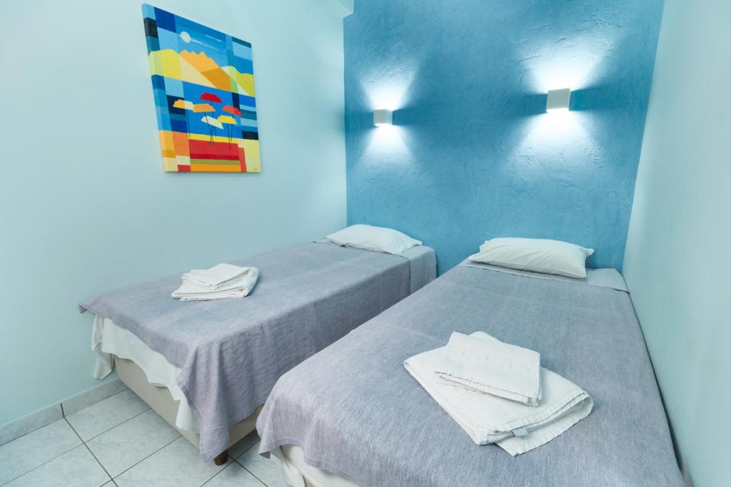 Voodi või voodid majutusasutuse Aggelos Hotel toas