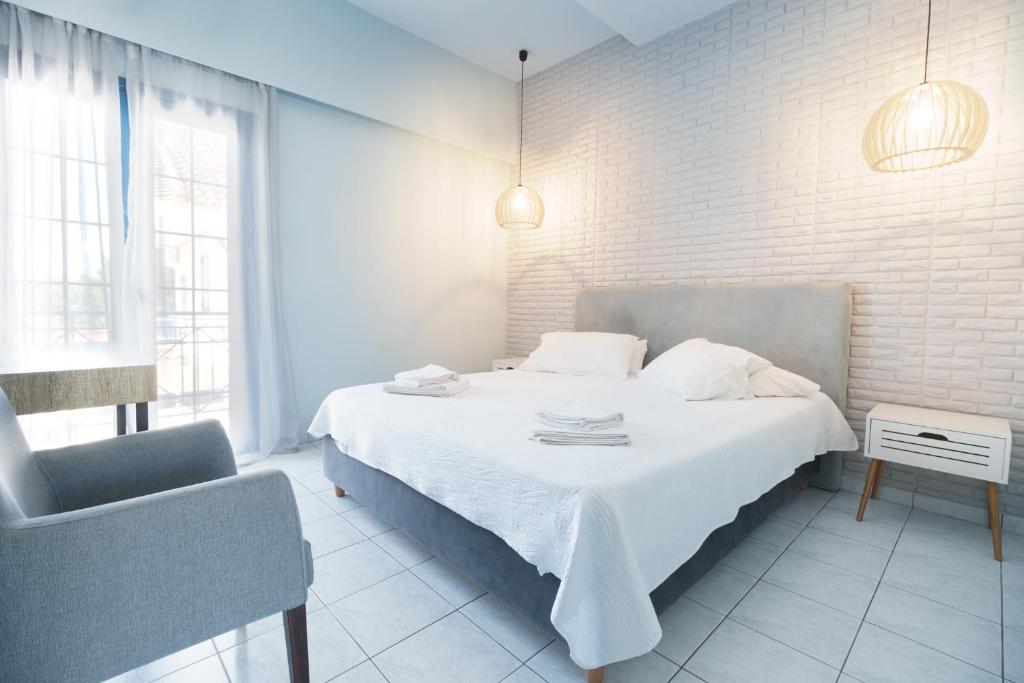 Voodi või voodid majutusasutuse Aggelos Hotel toas