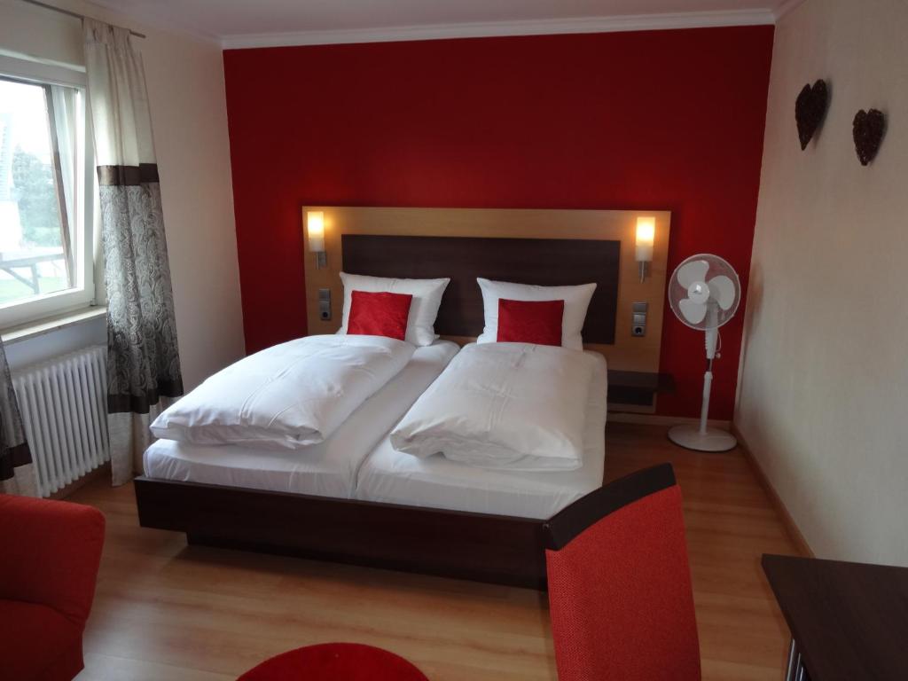 Postel nebo postele na pokoji v ubytování Hotel Ricci