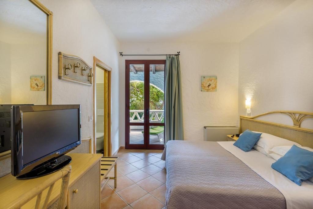 Postel nebo postele na pokoji v ubytování Hotel Mon Repos