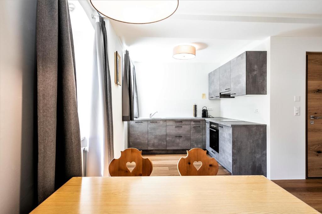Kuchyň nebo kuchyňský kout v ubytování Hotel Münsterhof
