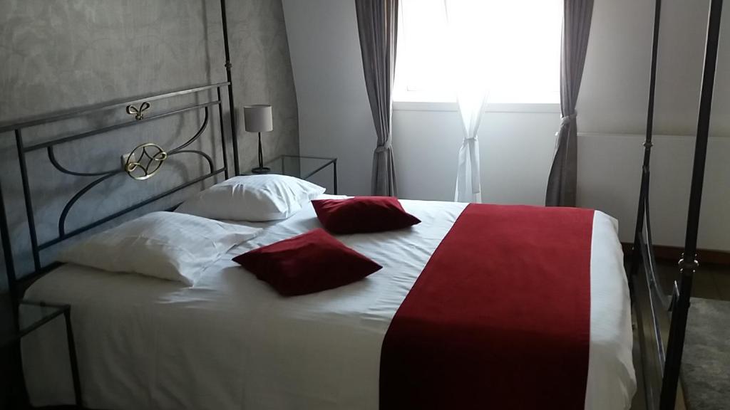 Postel nebo postele na pokoji v ubytování B&B Villa Des Raisins