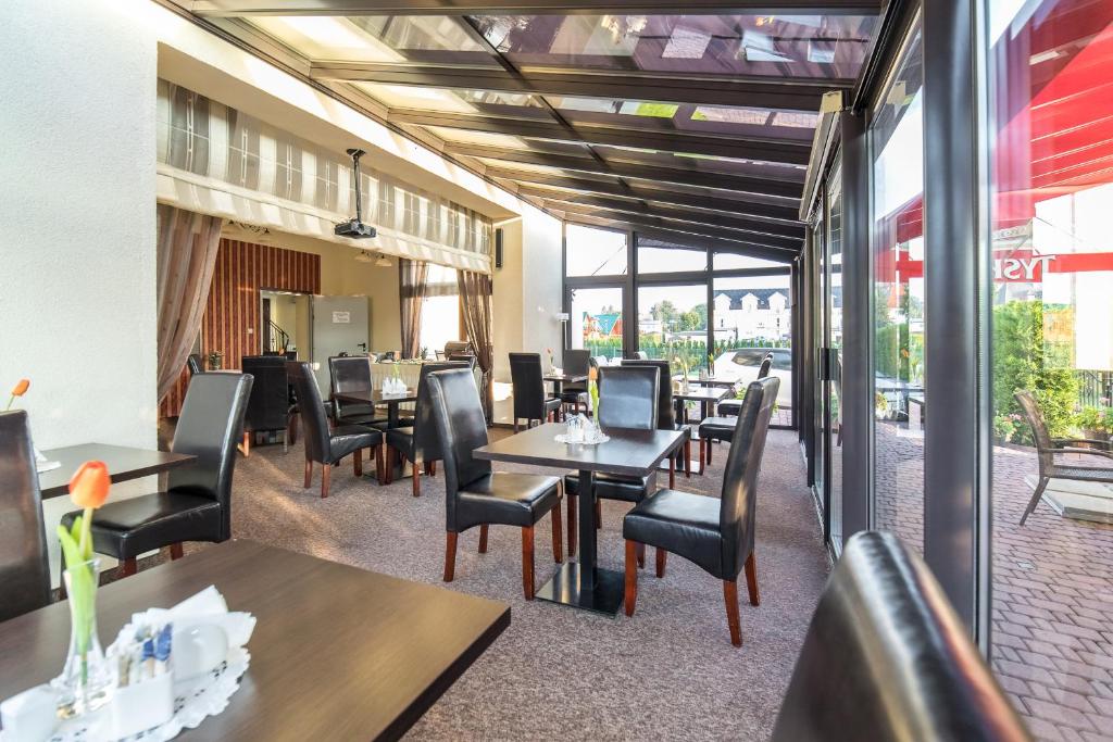 Reštaurácia alebo iné gastronomické zariadenie v ubytovaní Pensjonat SPA Dolce Vita