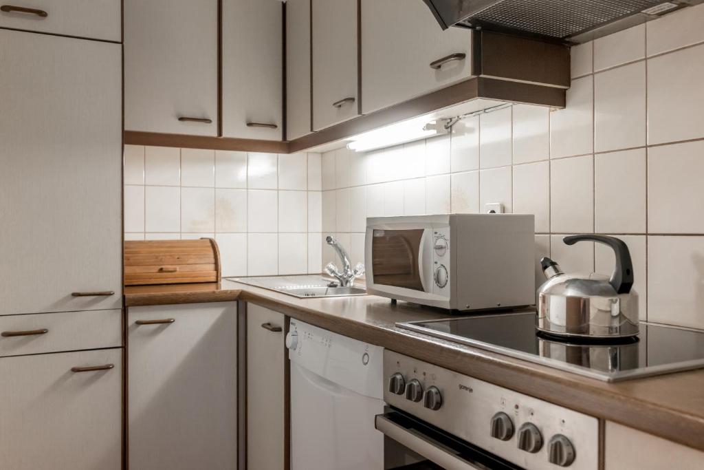 Kuchyň nebo kuchyňský kout v ubytování Das Kaltschmid - Familotel Tirol