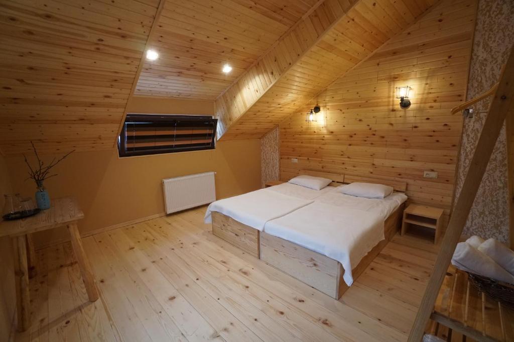 Postel nebo postele na pokoji v ubytování Ioska's House