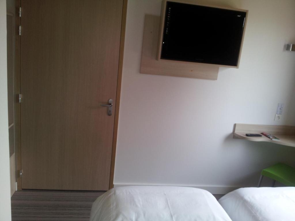 Postel nebo postele na pokoji v ubytování Fasthotel Dunkerque