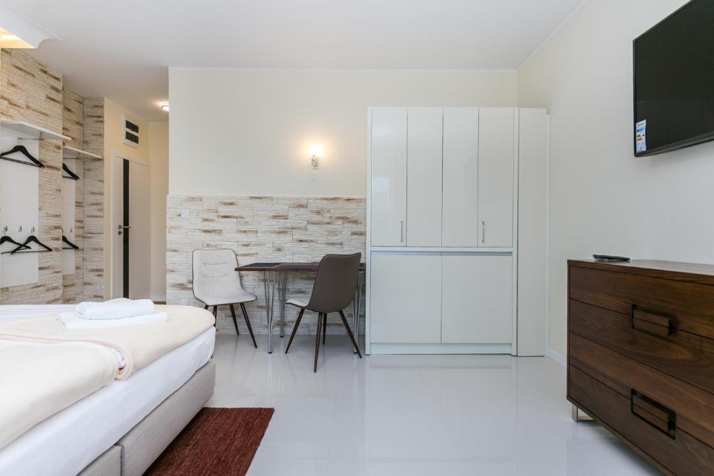 Postel nebo postele na pokoji v ubytování Apartamenty Dom Saski 10 minut od Centrum Warszawy
