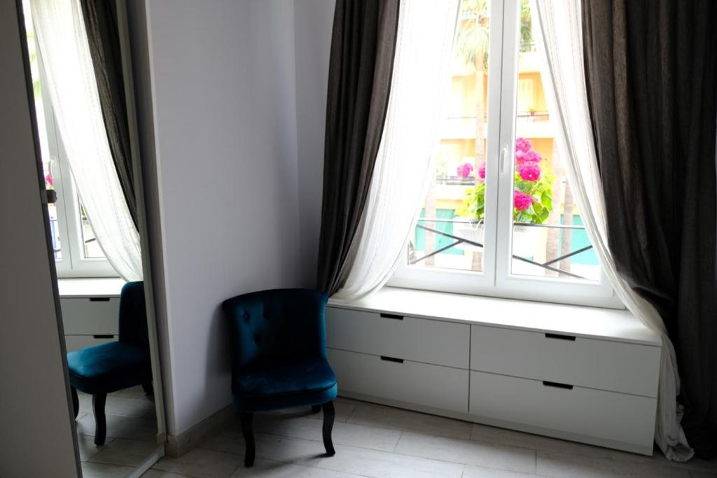 Postel nebo postele na pokoji v ubytování Apartments Monaco