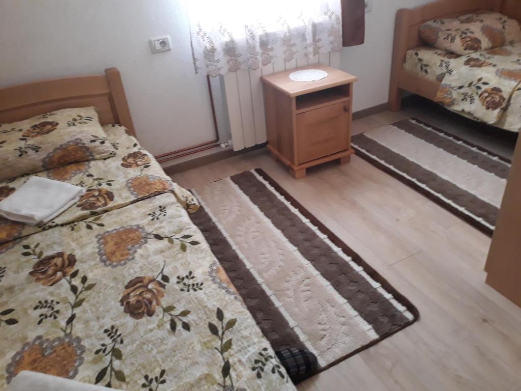 Postel nebo postele na pokoji v ubytování Rooms Skorpijon