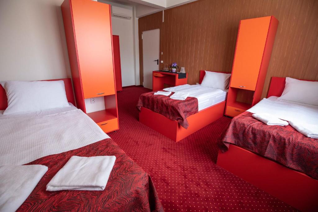 Posteľ alebo postele v izbe v ubytovaní Népliget Hotel