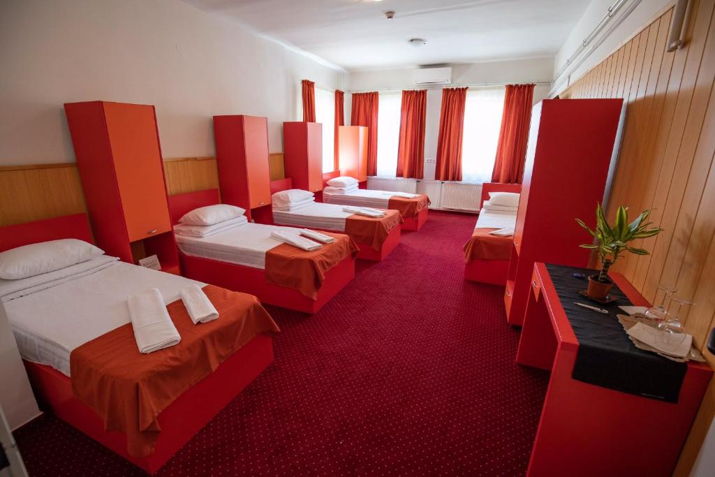 Posteľ alebo postele v izbe v ubytovaní Népliget Hotel