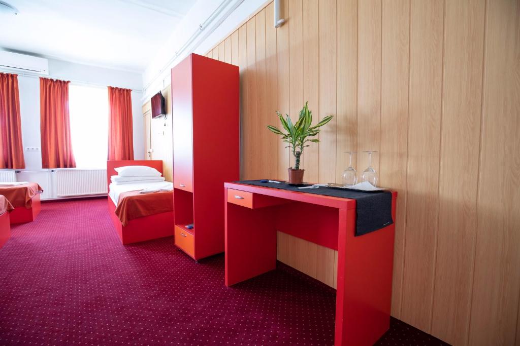 Posteľ alebo postele v izbe v ubytovaní Népliget Hotel