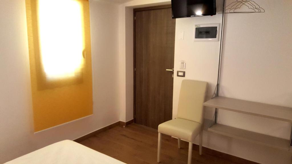 TV a/nebo společenská místnost v ubytování B&B Il Campanile