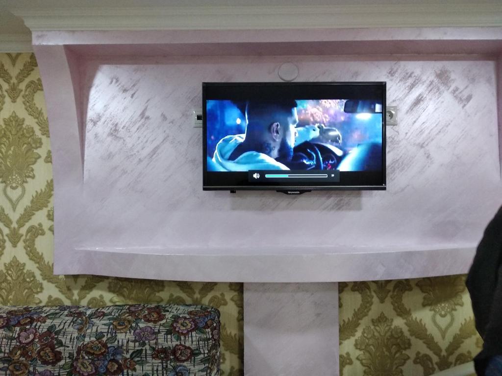 TV a/nebo společenská místnost v ubytování Dream House & Hostel