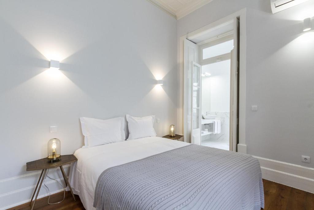 Postel nebo postele na pokoji v ubytování AQ 188 Guest House