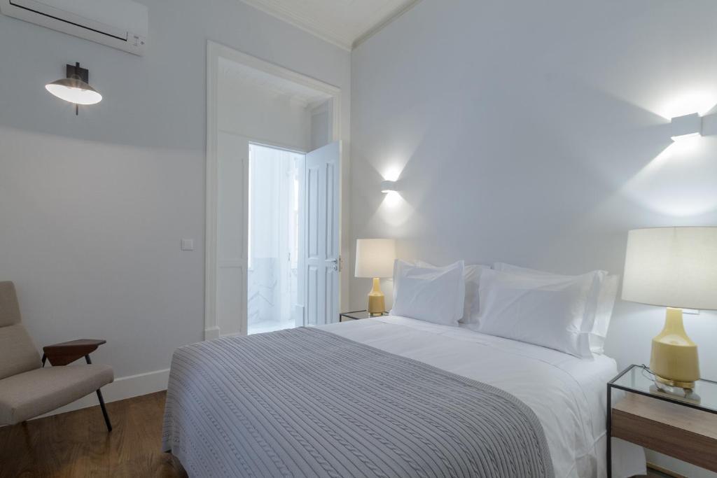 Postel nebo postele na pokoji v ubytování AQ 188 Guest House