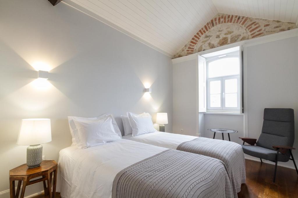 Postel nebo postele na pokoji v ubytování AQ 188 Guest House