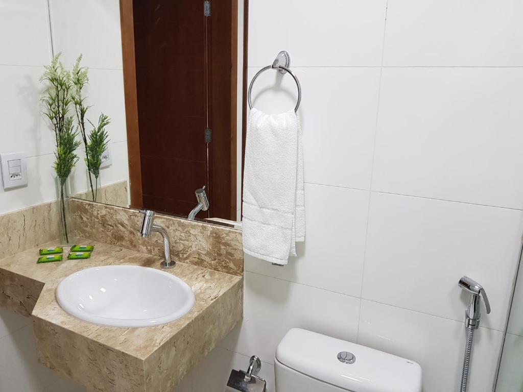 Koupelna v ubytování New Concept Hotel