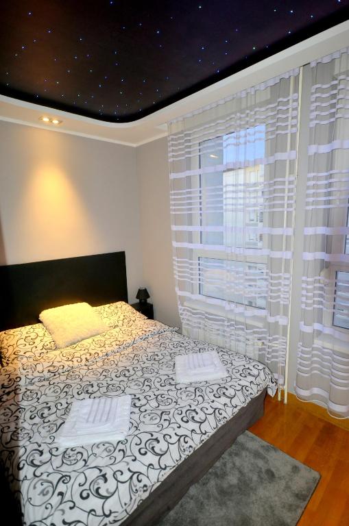Postel nebo postele na pokoji v ubytování Clean&Cozy Apartments Novi Beograd