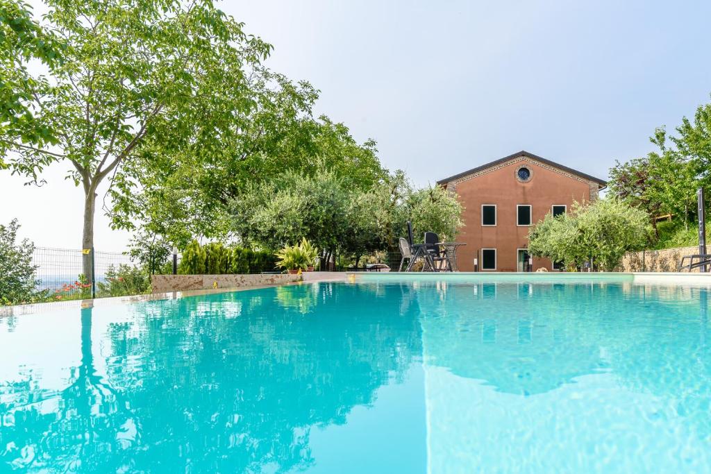 Bazén v ubytování Ca' Dei Coci B&B nebo v jeho okolí