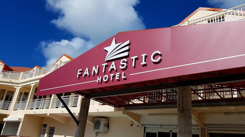 a building with a sign that reads famesta hotel at Fantastic Hotel in Marigot