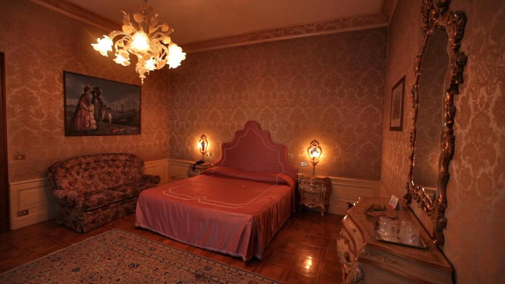 Postel nebo postele na pokoji v ubytování Park Hotel Villa Giustinian