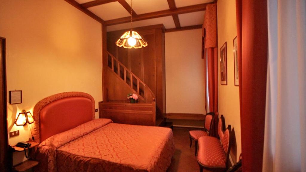 Postel nebo postele na pokoji v ubytování Park Hotel Villa Giustinian
