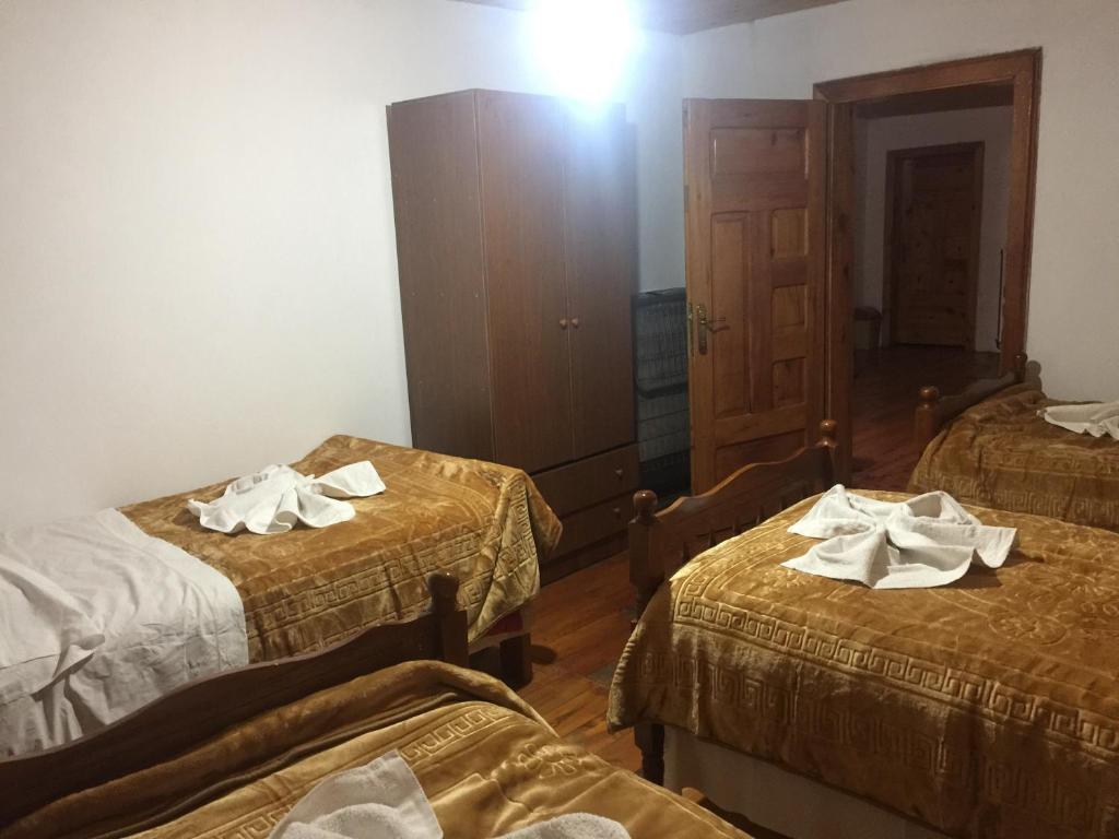 Postel nebo postele na pokoji v ubytování Guesthouse Alpini