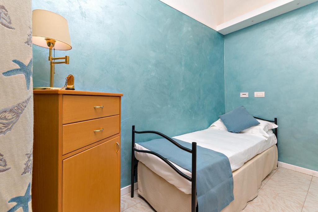 Posteľ alebo postele v izbe v ubytovaní Hotel Monte Rosa