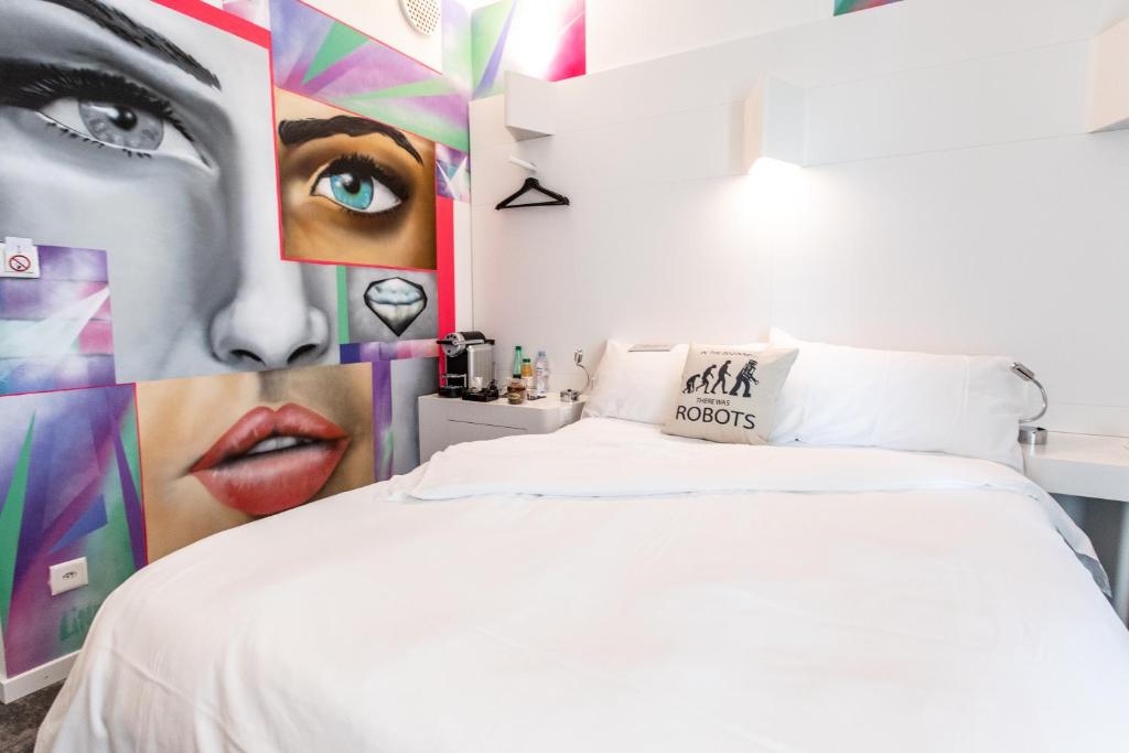 Postel nebo postele na pokoji v ubytování ibis Styles Lausanne Center MadHouse