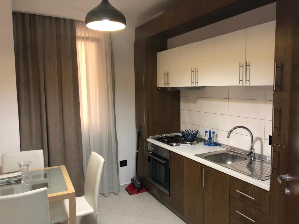 Carpe Diem Apartments-Hotel tesisinde mutfak veya mini mutfak