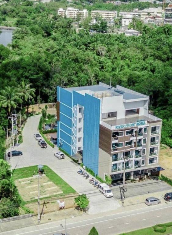 an overhead view of a building with a parking lot at River Front Krabi Hotel in Krabi