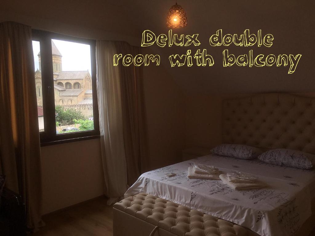 Postel nebo postele na pokoji v ubytování Hotel Bagineti
