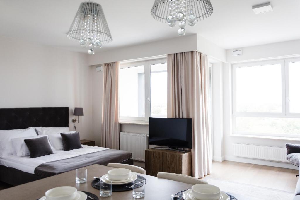 Posteľ alebo postele v izbe v ubytovaní LuxLux Apartments Coconut