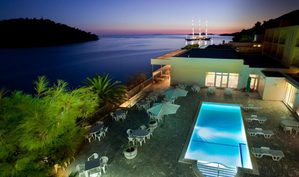 an aerial view of a resort with a swimming pool at Aminess Lume Hotel in Brna