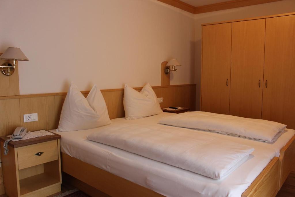 Postel nebo postele na pokoji v ubytování Christeinerhof