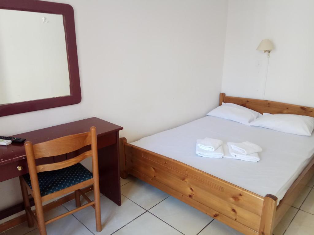 Postel nebo postele na pokoji v ubytování Delfini Hotel