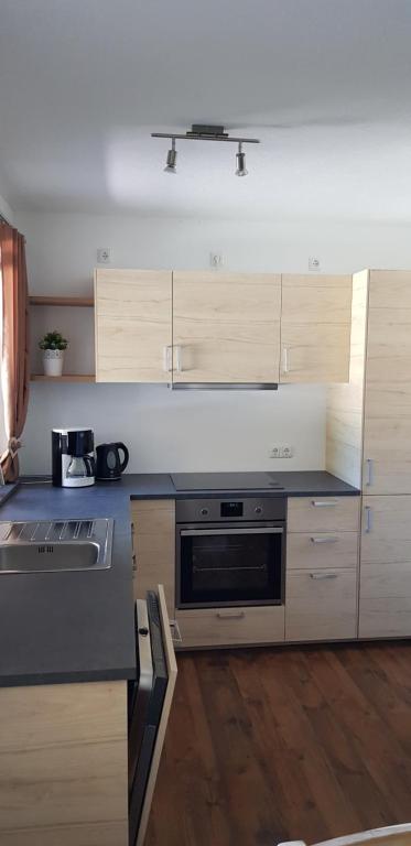 Kuchyň nebo kuchyňský kout v ubytování Haus Huber