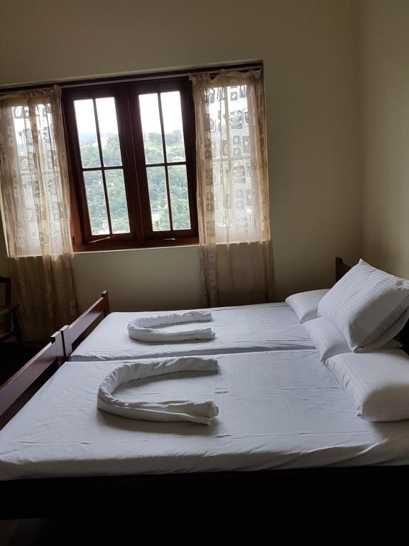Postel nebo postele na pokoji v ubytování No 51, Menik Home Rest