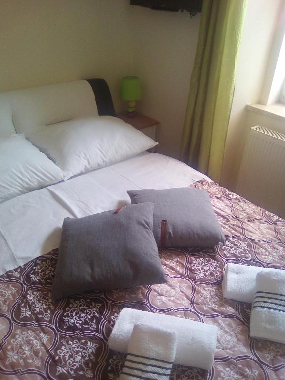 Postel nebo postele na pokoji v ubytování ELG Rooms