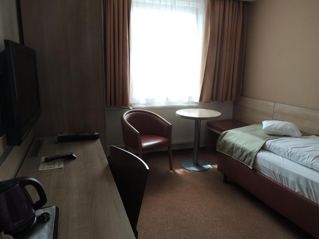 TV a/nebo společenská místnost v ubytování Hotel Club